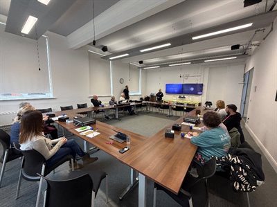 Group of people in an office meeting room