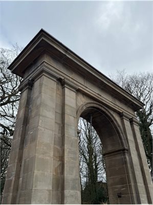Newly refurbished stone gate