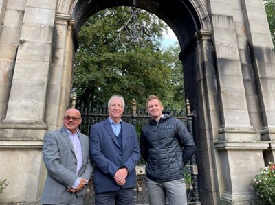 (L-R) Keith Bergman (general manager, Haigh Woodland Park), Cllr David Molyneux MBE (Leader, Wigan Council) and Stuart Holden (Be Well Wigan service manager) outside the Plantation Gates