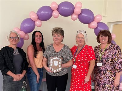 Lynn Dauson with daughter Cheryl and council staff
