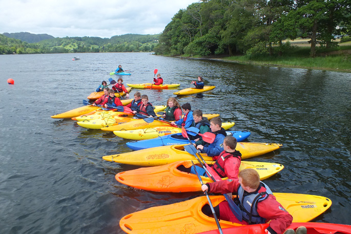 Students about to embark on a canoeing adventure