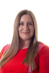Woman with long hair and a red top