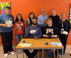 Group of people taking part in an interactive digital experience