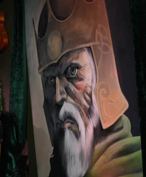 A contemporary painting of the ancient Irish King Brian Borou.  He is depicted as a white-bearded older man with a bronze helmet decorated with stylised knotwork.