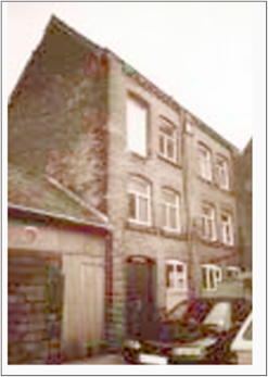 Old, three-storey brewery building from the 1800s